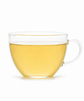 Taza de cristal con infusión de té Oolong Melocotón